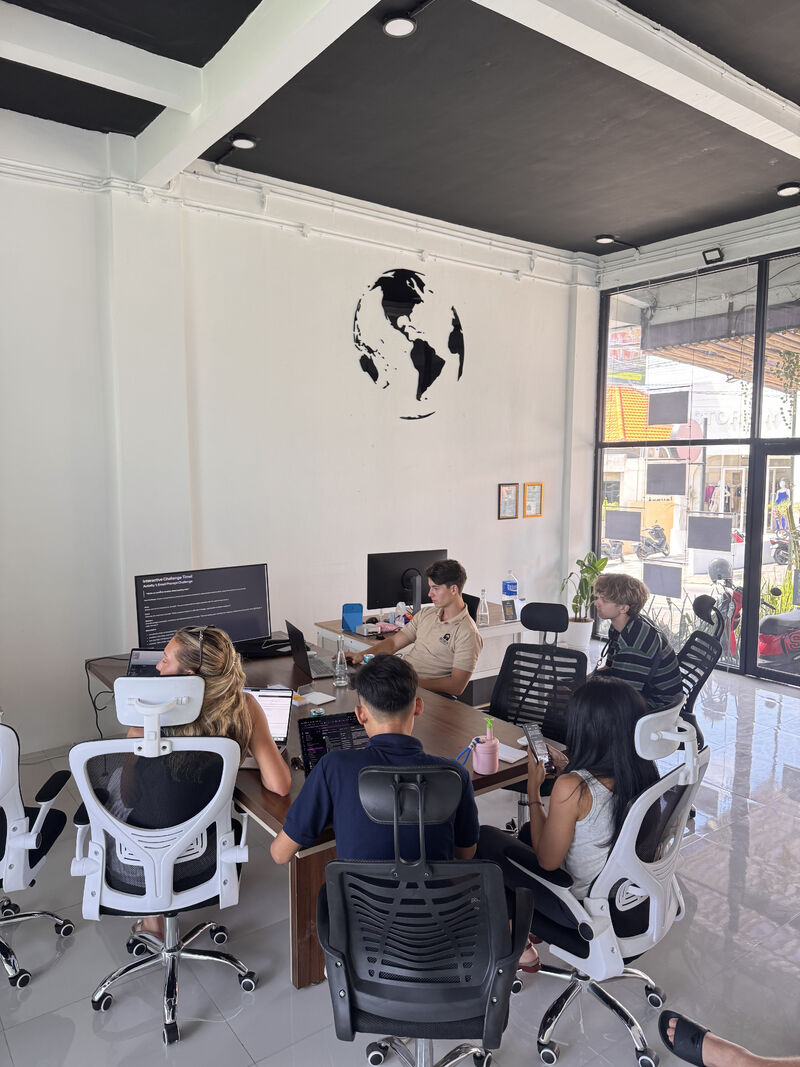 Pellago team working through hands-on AI tasks on their laptops during the kratt workshop