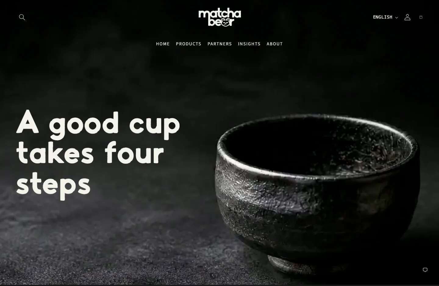 The Matcha Bear homepage in the new black and green identity