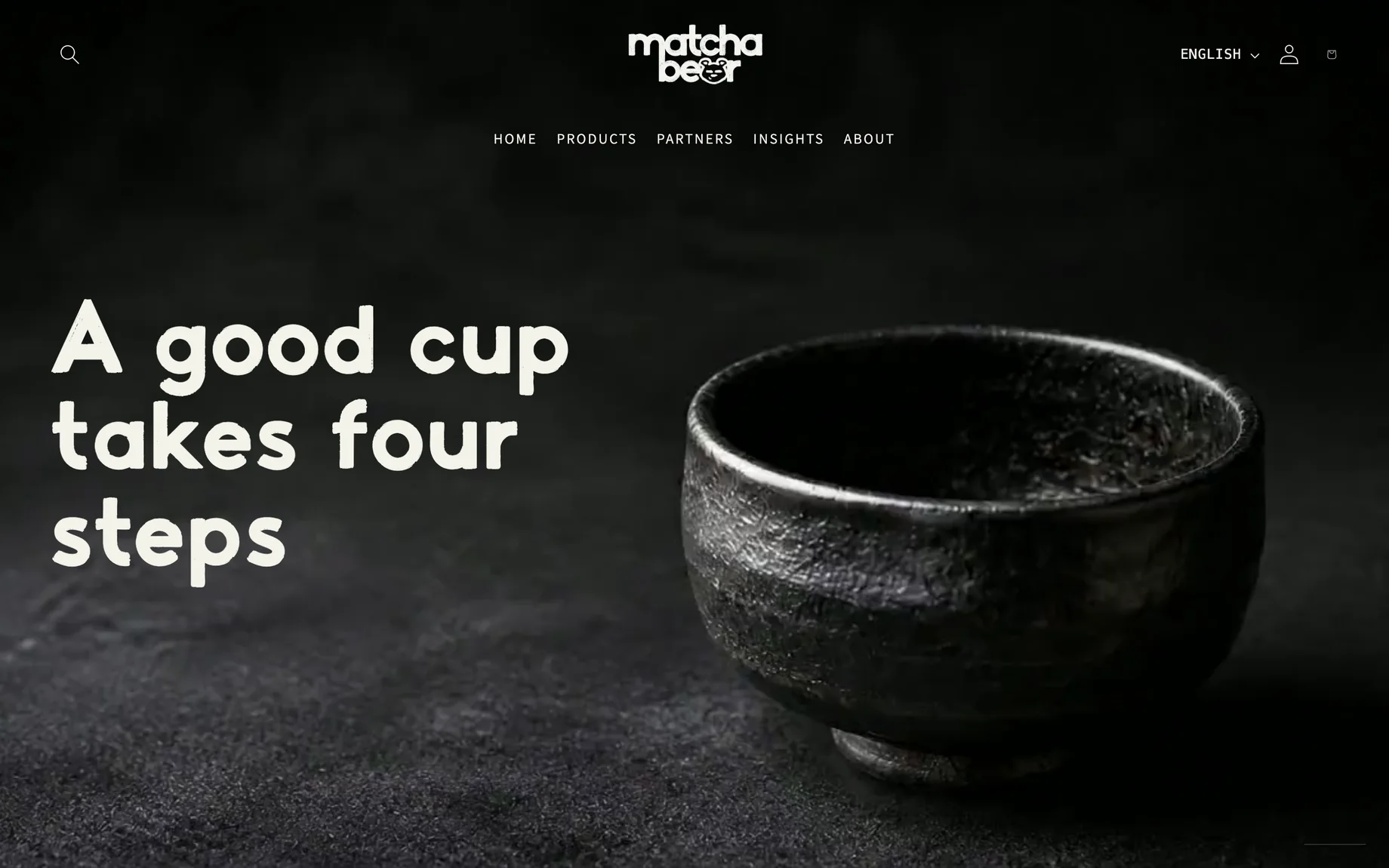 The Matcha Bear homepage on a computer: black header with the white Matcha Bear logo, the menu Home, Products, Partners, Insights, About, and the headline "A good cup takes four steps" beside a dark ceramic matcha bowl. The bowl picture is AI-generated.